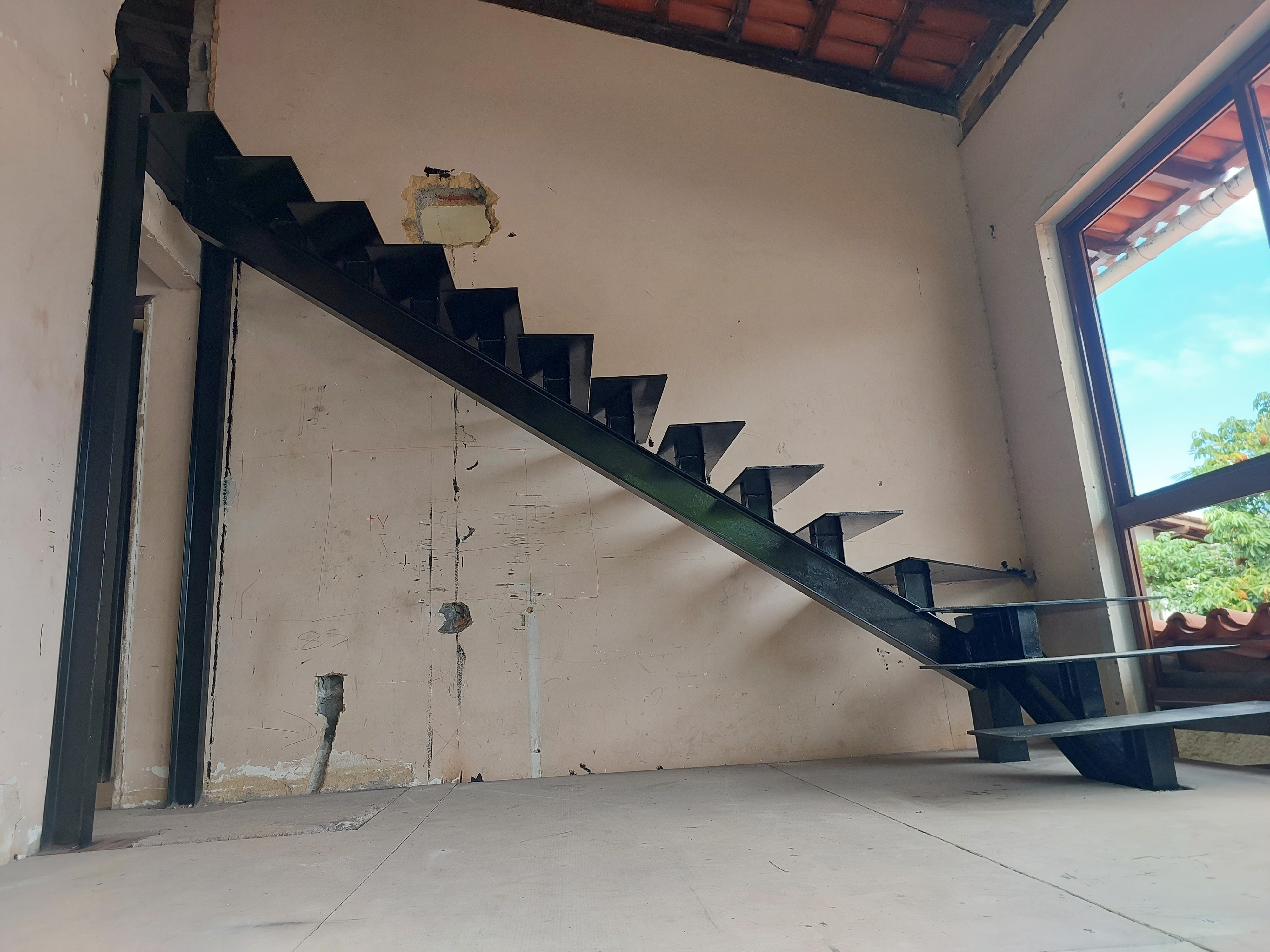 Case de escada e estrutura metálica